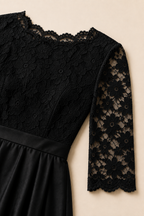 Vestido de encaje negro Valorenne — detalle del cuerpo y la manga