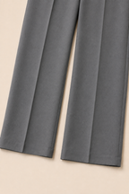 Pantalón ancho gris Valorenne — detalle de pierna y bajo