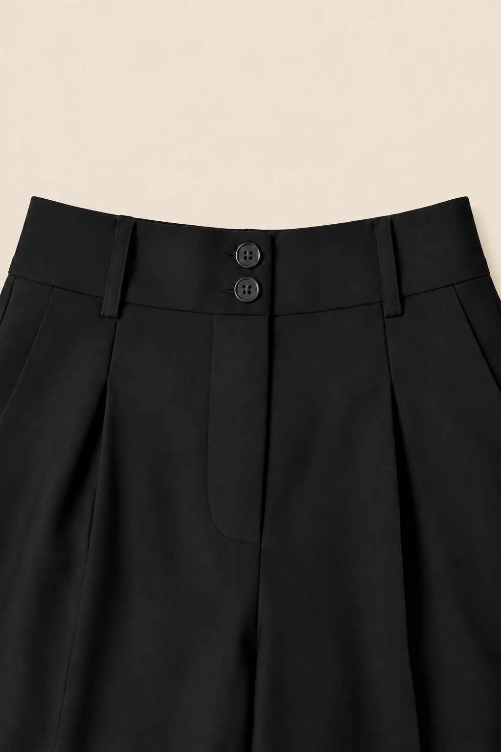 Pantalón ancho de cintura alta negro Valorenne — detalle de cintura y doble botón