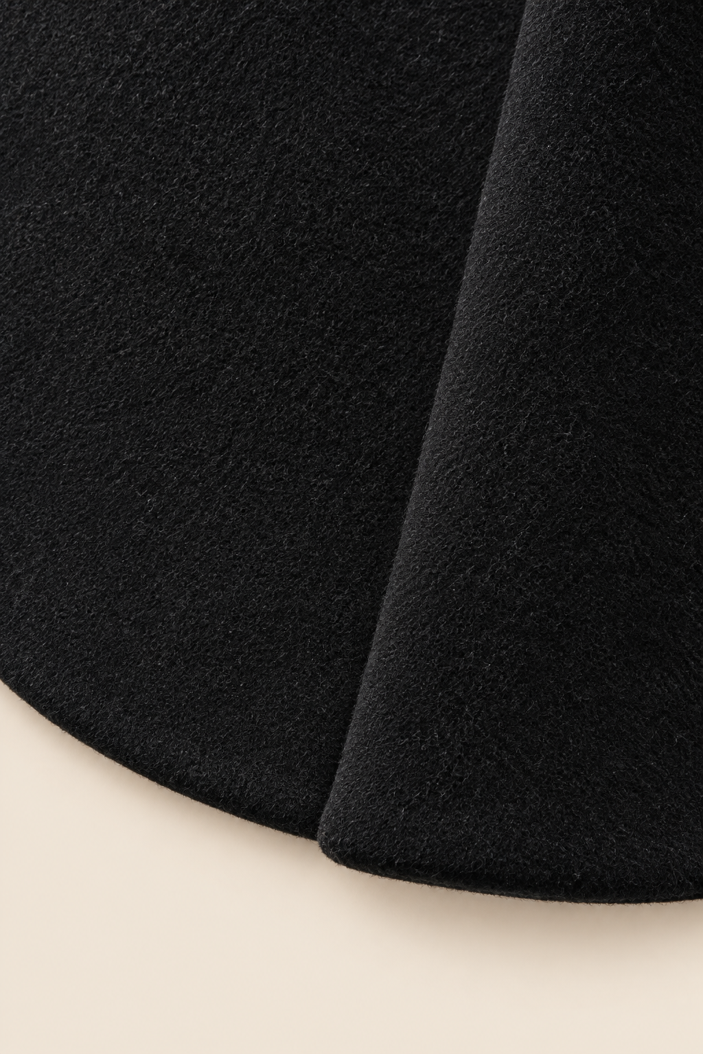 Americana texturizada Negro, detalle tejido dobladillo