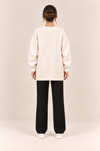 Jersey con cremallera lateral en albaricoque, vista trasera