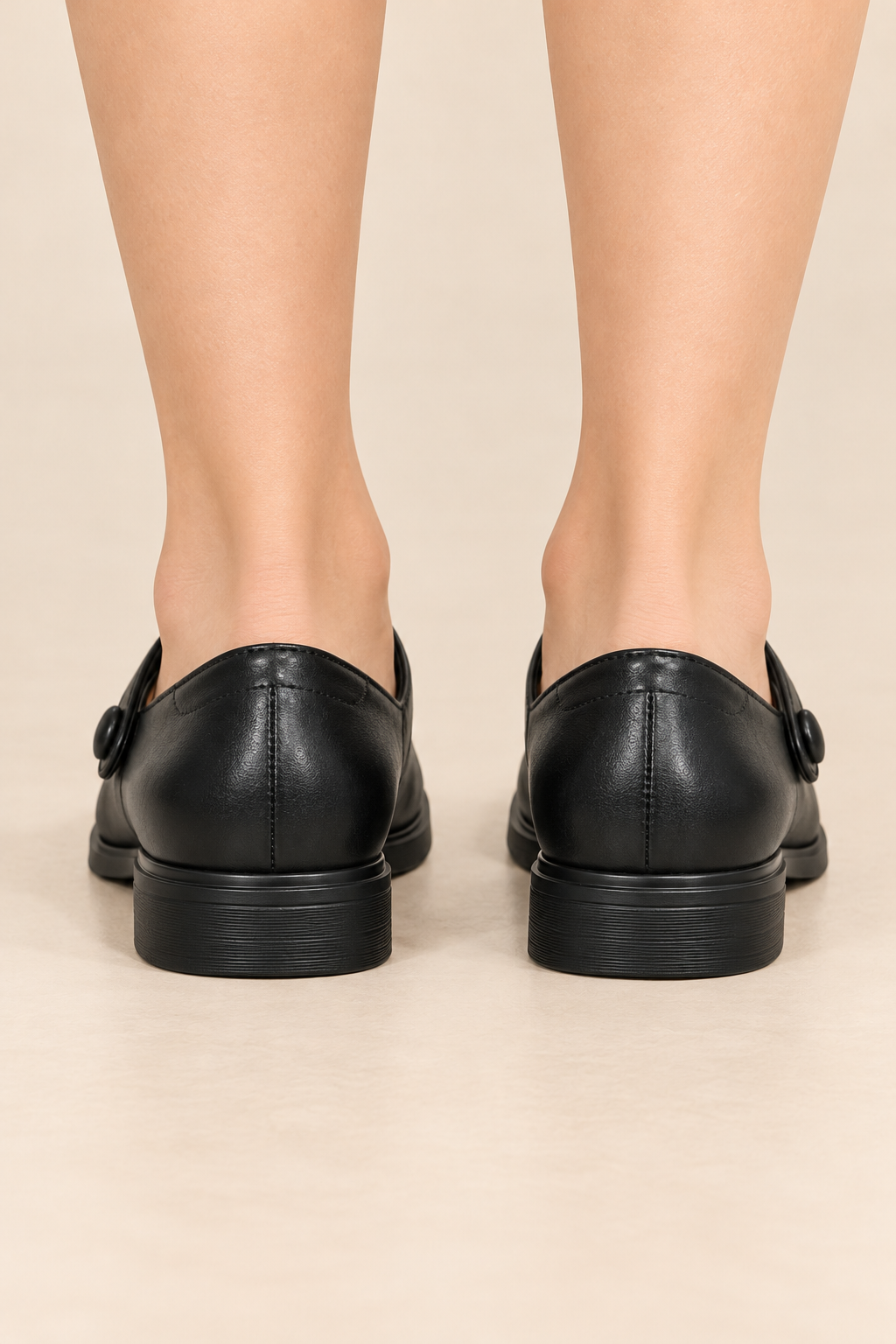 Zapatos Mary Jane planos en negro, vista trasera