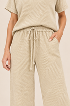 Conjunto texturizado de top y pantalón Valorenne, crudo, detalle del pantalón