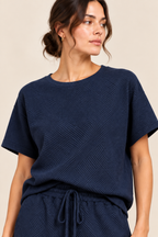 Conjunto texturizado de top y pantalón Valorenne, azul marino, detalle del top